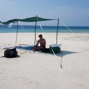 Meditation on the idyllic sandbank 'Dead Man's Island' in the Indian Ocean Vilanculos Mozambique