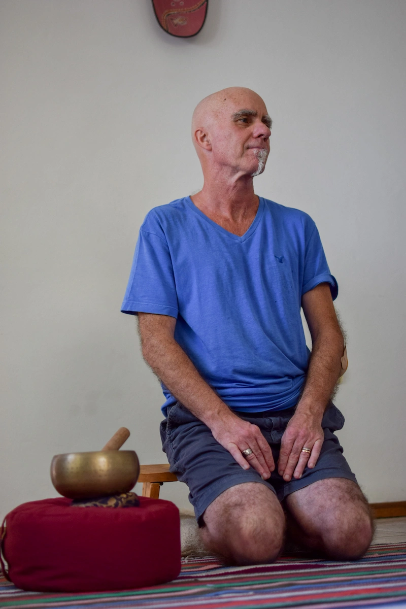 Portrait of Gerry Rickard, mindfulness meditation teacher in Mozambique, with a calm and welcoming expression,helping you to find your inner stillness