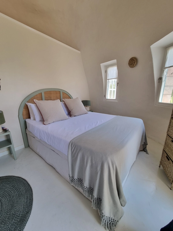 Double room in inique dome-style accommodation at Humbi Farm in Mozambique, featuring rounded architectural structures set within a natural landscape, blending sustainable design with a tropical retreat environment.