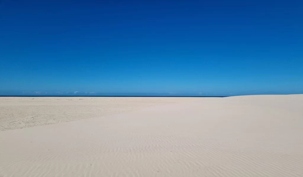 White sand and cloudless blue sky in the Bazaruto Archipelago